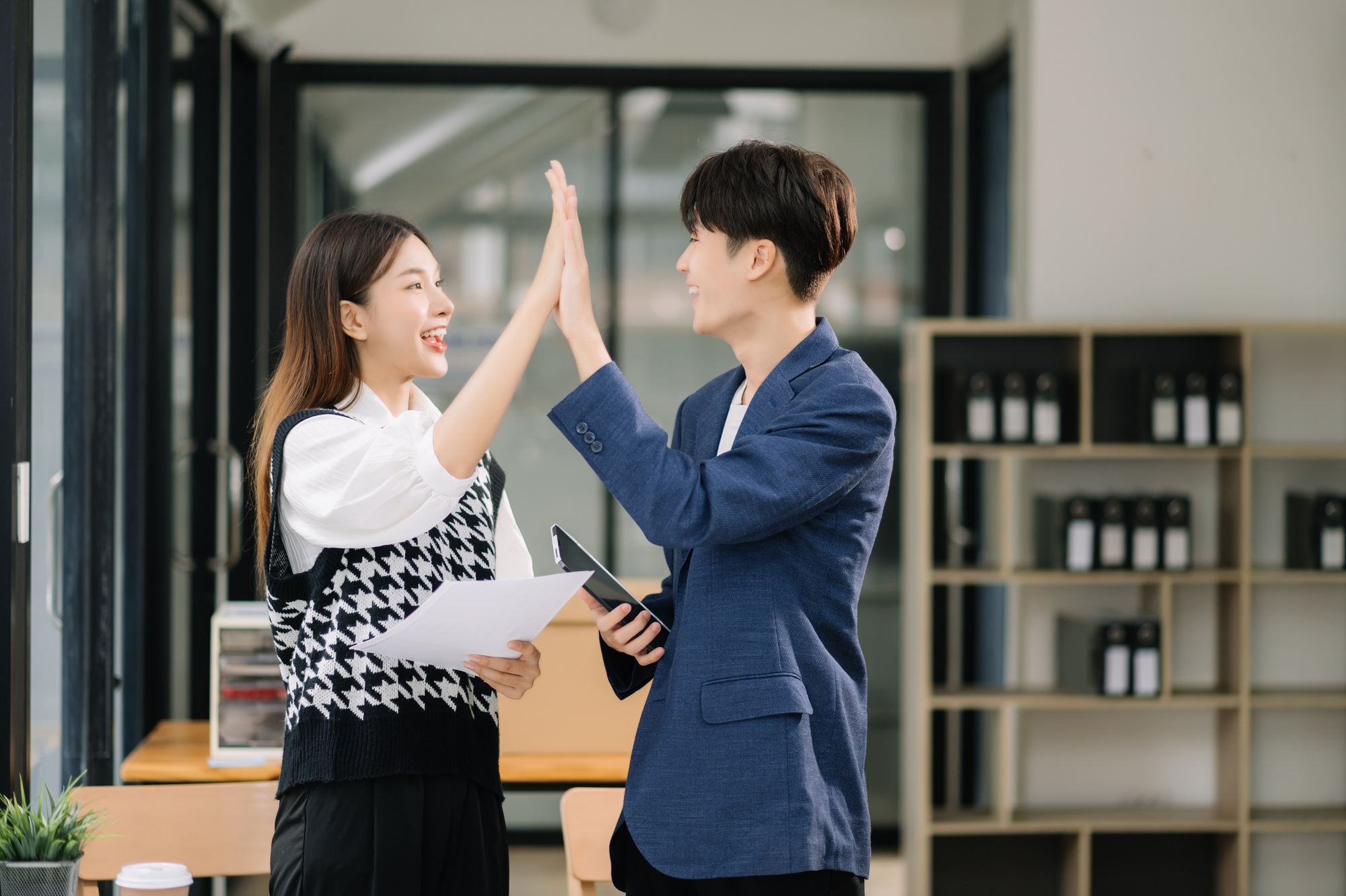 Business Show me the joy hi five hands With businesswomen executives celebrating the success